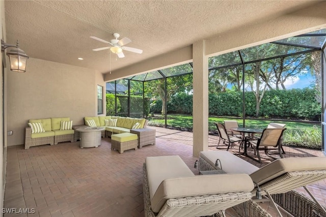 3267 Pacific Dr, Naples, FL 34119 - view of patio / terrace featuring outdoor lounge area, a lanai, a ceiling fan, and outdoor dining area