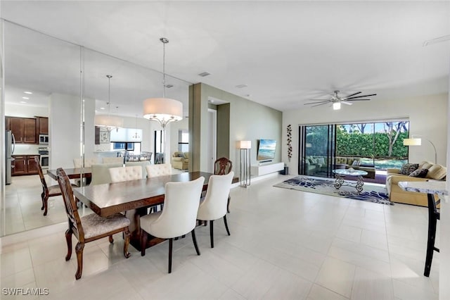 3267 Pacific Dr, Naples, FL 34119 - dining room with a ceiling fan