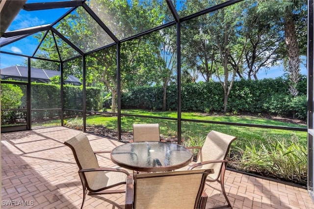 3267 Pacific Dr, Naples, FL 34119 - view of patio / terrace featuring outdoor dining area and a lanai