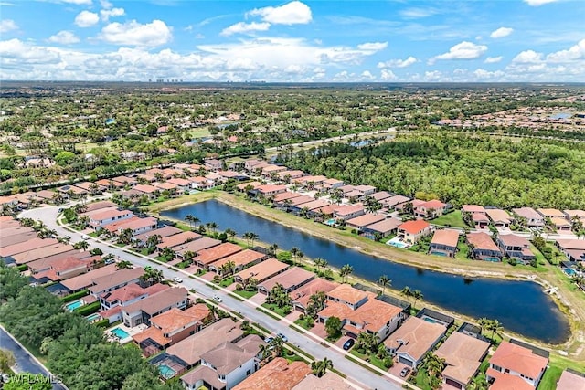 aerial view featuring a residential view and a water view