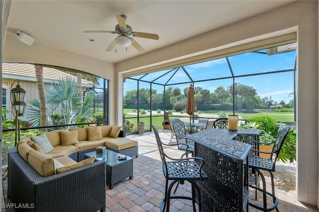 12732 Fox Ridge Dr, Bonita Springs, FL 34135 - sunroom / solarium featuring outdoor lounge area, outdoor dining space, ceiling fan, and golf course view