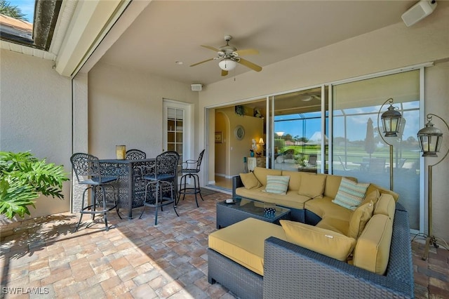12732 Fox Ridge Dr, Bonita Springs, FL 34135 - view of patio / terrace featuring a ceiling fan, an outdoor hangout area, and outdoor dining area