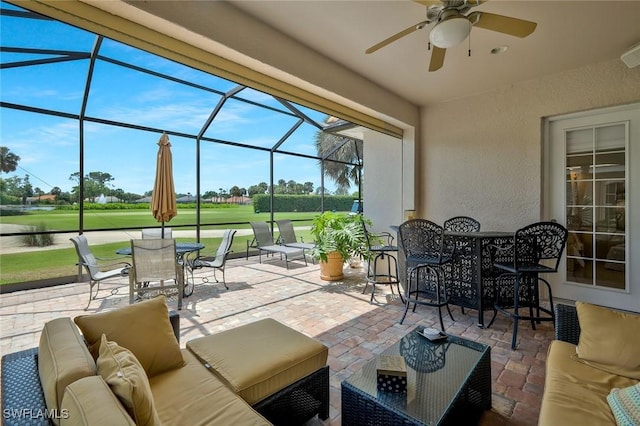 12732 Fox Ridge Dr, Bonita Springs, FL 34135 - view of patio / terrace featuring a ceiling fan, view of golf course, an outdoor hangout area, and a lanai