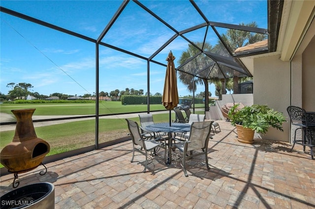 12732 Fox Ridge Dr, Bonita Springs, FL 34135 - view of patio / terrace with outdoor dining space, golf course view, and a lanai
