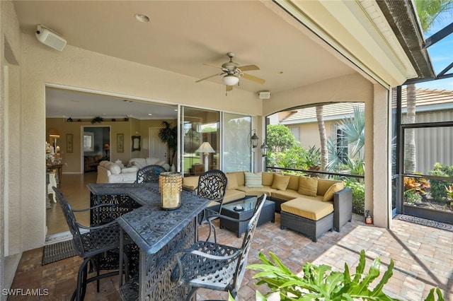 12732 Fox Ridge Dr, Bonita Springs, FL 34135 - view of patio with a lanai, an outdoor hangout area, and a ceiling fan