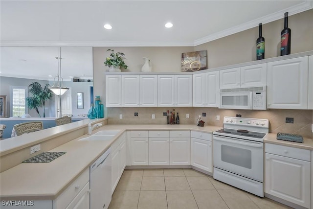 12732 Fox Ridge Dr, Bonita Springs, FL 34135 - kitchen with white appliances, light tile patterned flooring, light countertops, a sink, and decorative backsplash