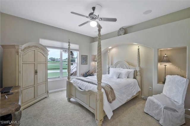 12732 Fox Ridge Dr, Bonita Springs, FL 34135 - bedroom with light carpet, baseboards, and a ceiling fan