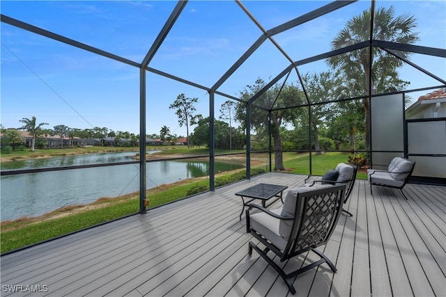 15890 Delasol Ln, Naples, FL 34110 - wooden terrace with a water view, outdoor lounge area, and glass enclosure