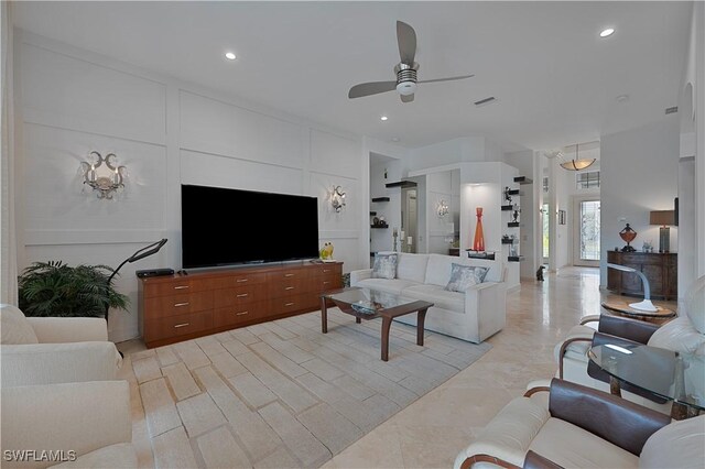 15890 Delasol Ln, Naples, FL 34110 - living room with ceiling fan and recessed lighting