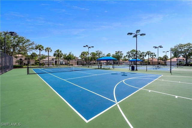15890 Delasol Ln, Naples, FL 34110 - view of tennis court featuring community basketball court