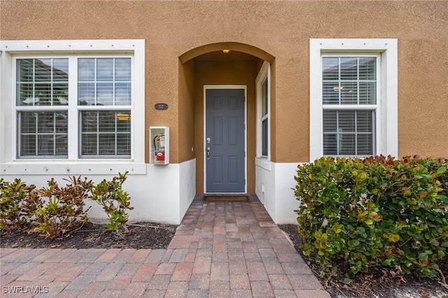 18276 Creekside Preserve Loop Unit 102, Fort Myers, FL 33908 - view of exterior entry with stucco siding