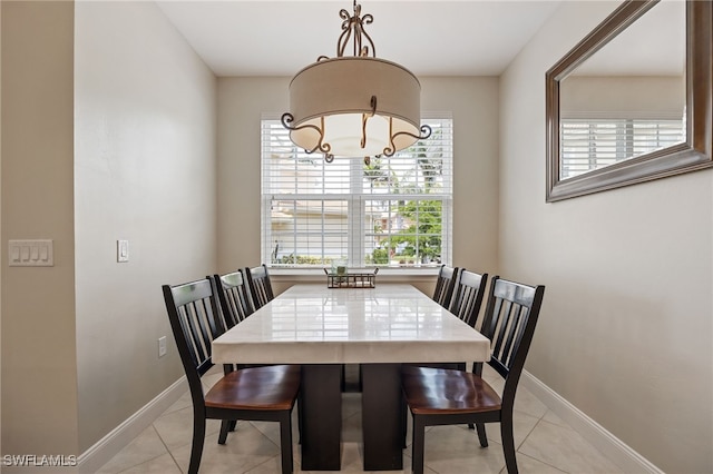 18276 Creekside Preserve Loop Unit 102, Fort Myers, FL 33908 - dining space featuring a chandelier and light tile patterned floors