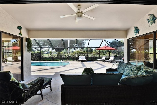 1803 Golfside Village Dr, Lehigh Acres, FL 33936 - view of patio featuring outdoor lounge area, a lanai, an outdoor pool, and a ceiling fan