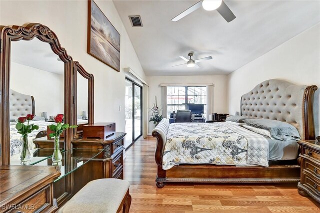 1803 Golfside Village Dr, Lehigh Acres, FL 33936 - bedroom featuring vaulted ceiling, access to outside, light wood finished floors, and ceiling fan