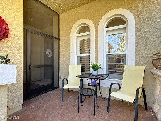 13885 Cleto Dr, Estero, FL 33928 - exterior space featuring a patio and stucco siding