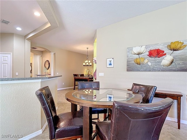 13885 Cleto Dr, Estero, FL 33928 - dining room with visible vents, light tile patterned floors, baseboards, decorative columns, and recessed lighting