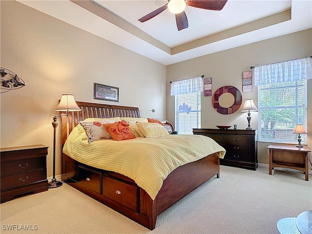 13885 Cleto Dr, Estero, FL 33928 - carpeted bedroom featuring baseboards, multiple windows, and a ceiling fan