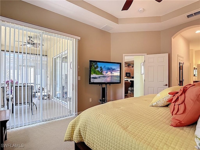 13885 Cleto Dr, Estero, FL 33928 - carpeted bedroom with arched walkways, access to exterior, ceiling fan, and visible vents