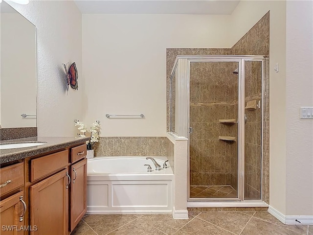 13885 Cleto Dr, Estero, FL 33928 - full bath with a shower stall, tile patterned floors, a garden tub, and vanity