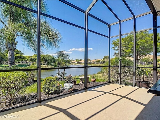 13885 Cleto Dr, Estero, FL 33928 - unfurnished sunroom with a water view and plenty of natural light