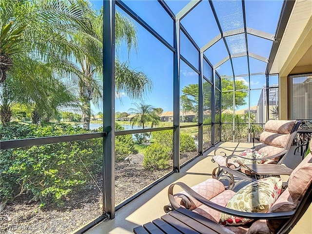 13885 Cleto Dr, Estero, FL 33928 - sunroom / solarium featuring a water view