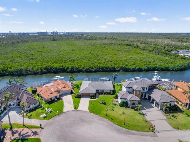 14701 Eden St, Fort Myers, FL 33908 - aerial view featuring a water view, a residential view, and a wooded view