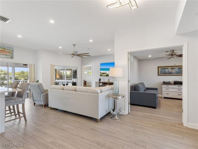 14701 Eden St, Fort Myers, FL 33908 - living room featuring a ceiling fan, visible vents, and recessed lighting