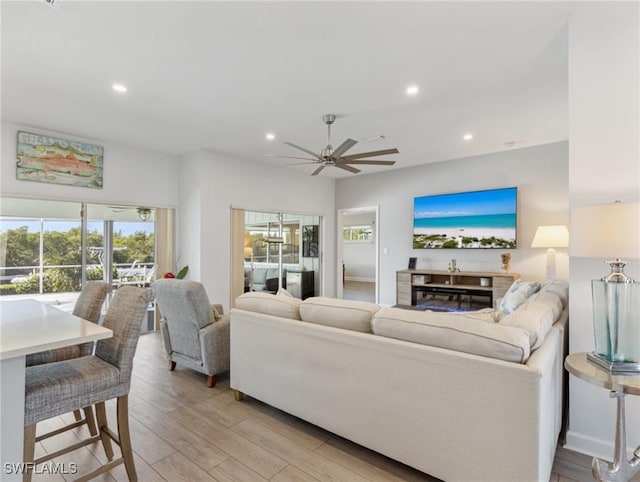 14701 Eden St, Fort Myers, FL 33908 - living area featuring a ceiling fan, light wood-style flooring, and recessed lighting