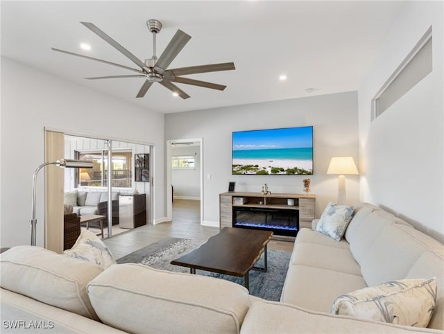 14701 Eden St, Fort Myers, FL 33908 - living room with recessed lighting, wood finished floors, a ceiling fan, and baseboards