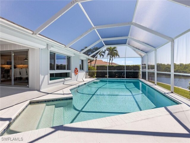 14701 Eden St, Fort Myers, FL 33908 - pool featuring glass enclosure and a patio