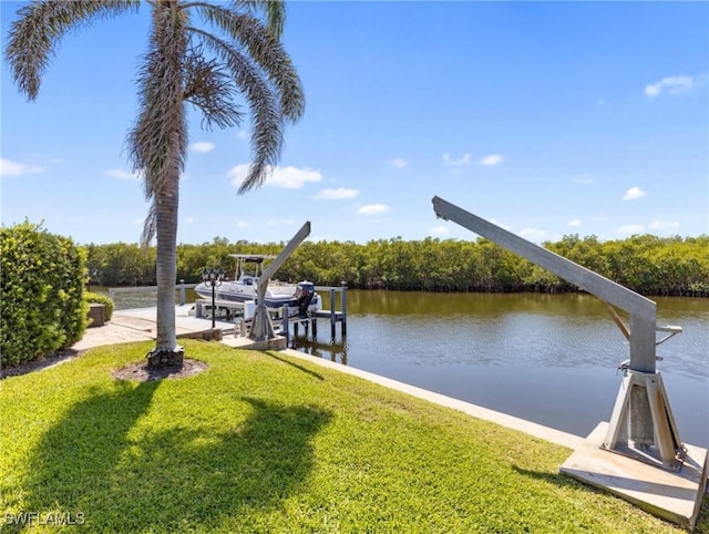 14701 Eden St, Fort Myers, FL 33908 - dock area with boat lift, a water view, and a yard