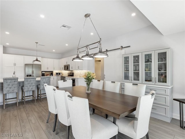 14701 Eden St, Fort Myers, FL 33908 - dining room featuring recessed lighting, light wood-style flooring, and visible vents