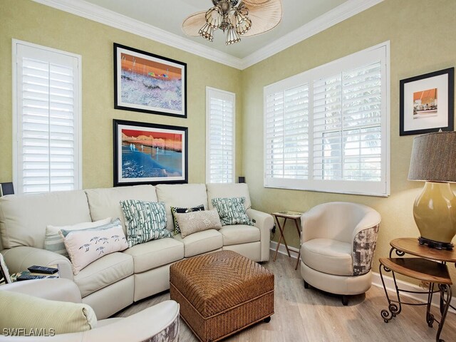2325 Mont Claire Dr Unit 201, Naples, FL 34109 - living room featuring baseboards, wood finished floors, ceiling fan, and crown molding