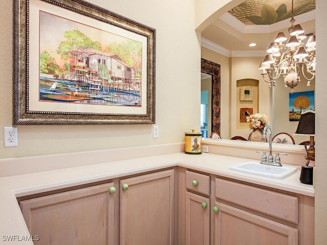 2325 Mont Claire Dr Unit 201, Naples, FL 34109 - bathroom featuring ornamental molding, an inviting chandelier, a tray ceiling, and vanity