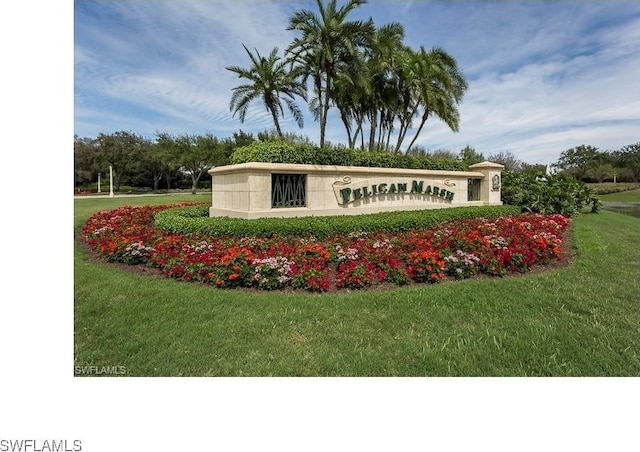 2325 Mont Claire Dr Unit 201, Naples, FL 34109 - community / neighborhood sign with a lawn