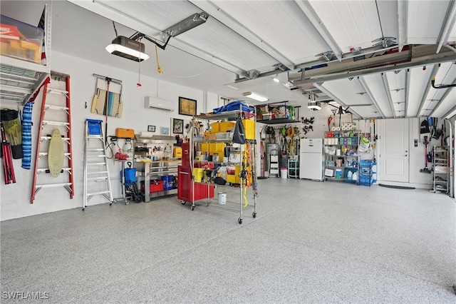 garage with a wall mounted AC, a workshop area, and a garage door opener