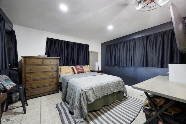 bedroom featuring recessed lighting and light tile patterned flooring