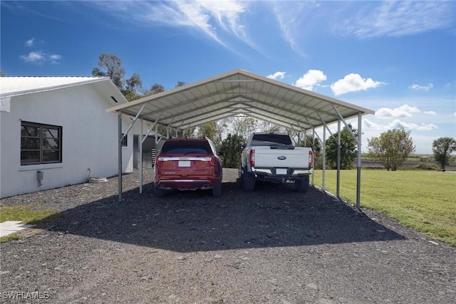 view of parking / parking lot with a carport and driveway