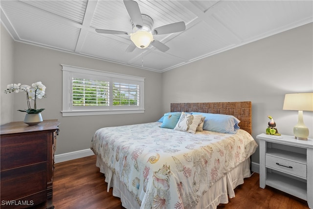bedroom with ceiling fan, baseboards, and dark wood finished floors