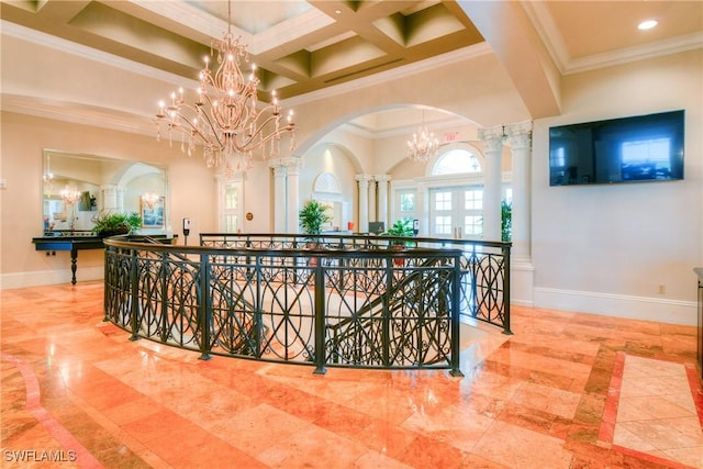 12125 Via Cercina Dr, Bonita Springs, FL 34135 - hallway with arched walkways, baseboards, a towering ceiling, an upstairs landing, and a chandelier