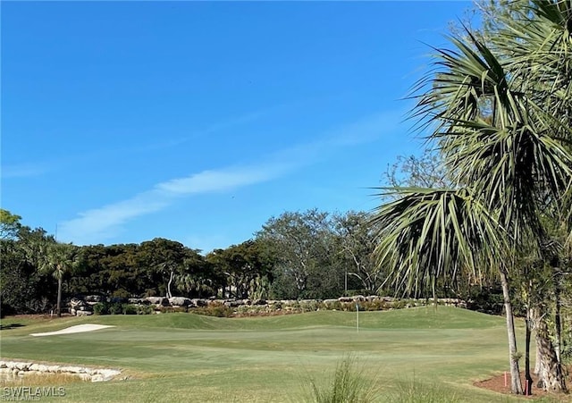 12125 Via Cercina Dr, Bonita Springs, FL 34135 - view of property's community with a lawn and view of golf course