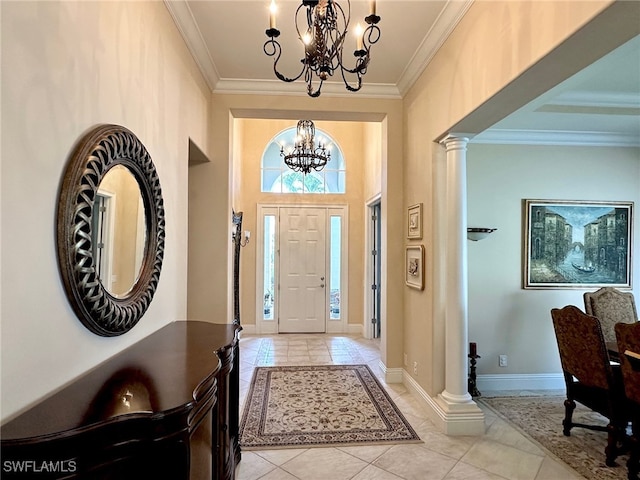 12125 Via Cercina Dr, Bonita Springs, FL 34135 - entryway featuring decorative columns, baseboards, ornamental molding, and an inviting chandelier