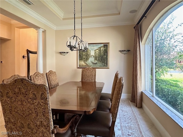12125 Via Cercina Dr, Bonita Springs, FL 34135 - dining space featuring a raised ceiling, baseboards, visible vents, a notable chandelier, and ornamental molding