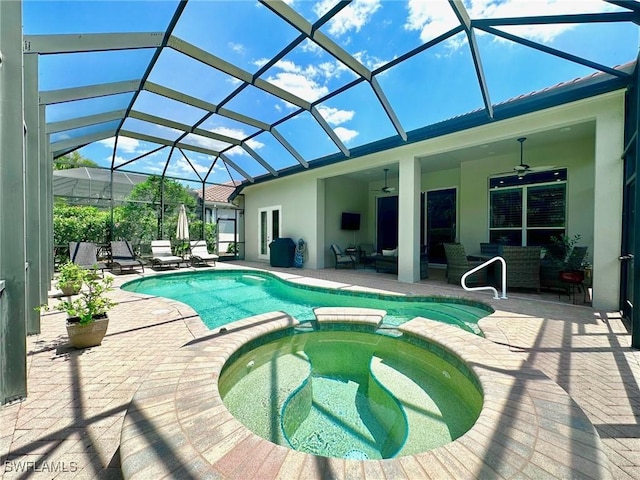 12125 Via Cercina Dr, Bonita Springs, FL 34135 - view of swimming pool featuring ceiling fan, a patio, a pool with connected hot tub, and an outdoor hangout area