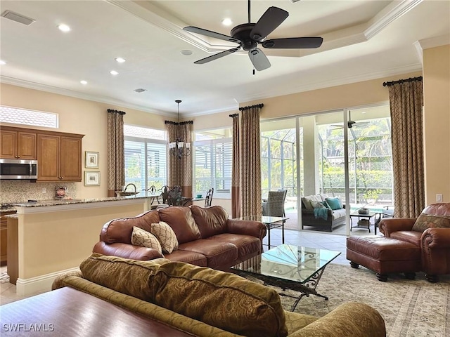 12125 Via Cercina Dr, Bonita Springs, FL 34135 - living room featuring recessed lighting, visible vents, ornamental molding, light tile patterned floors, and ceiling fan