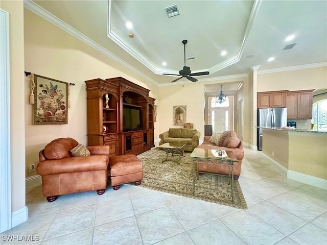 12125 Via Cercina Dr, Bonita Springs, FL 34135 - living room with ceiling fan, light tile patterned flooring, a tray ceiling, and visible vents