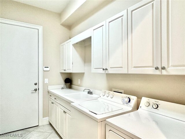 12125 Via Cercina Dr, Bonita Springs, FL 34135 - laundry room with washer and dryer, a sink, light tile patterned floors, and cabinet space