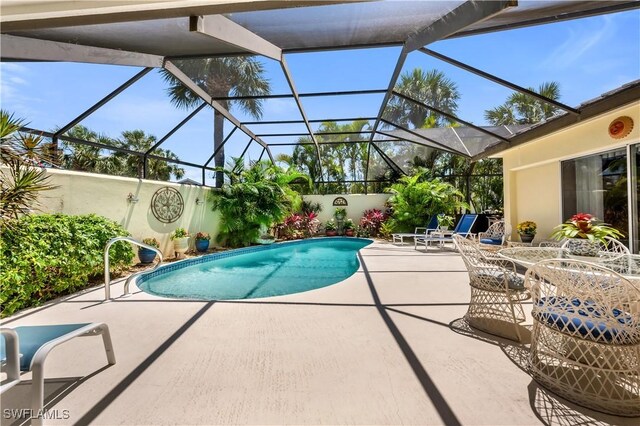 3098 Greenflower Ct, Bonita Springs, FL 34134 - view of pool featuring a patio area and glass enclosure