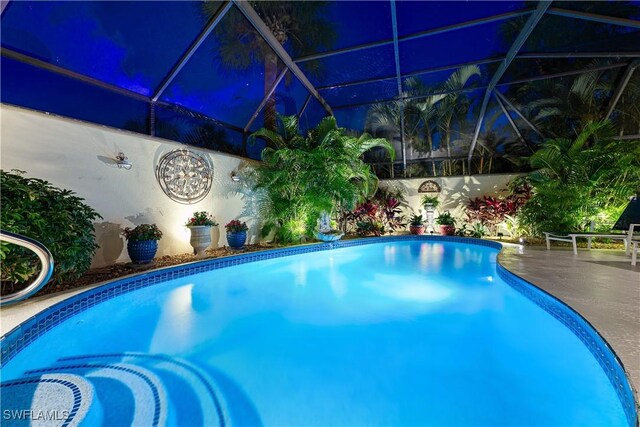 3098 Greenflower Ct, Bonita Springs, FL 34134 - outdoor pool with a lanai and a patio area