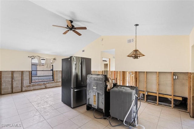6181 Plumosa Ave, Fort Myers, FL 33908 - kitchen featuring freestanding refrigerator, a ceiling fan, light tile patterned flooring, visible vents, and lofted ceiling